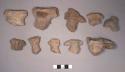 13 upper parts of pottery figurine bodies