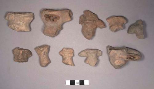 13 upper parts of pottery figurine bodies