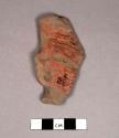 Large red slipped pottery hollow figurine head fragment