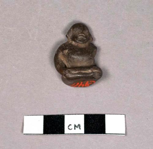 Figurine -seated