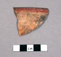 Red on orange ware rim sherd