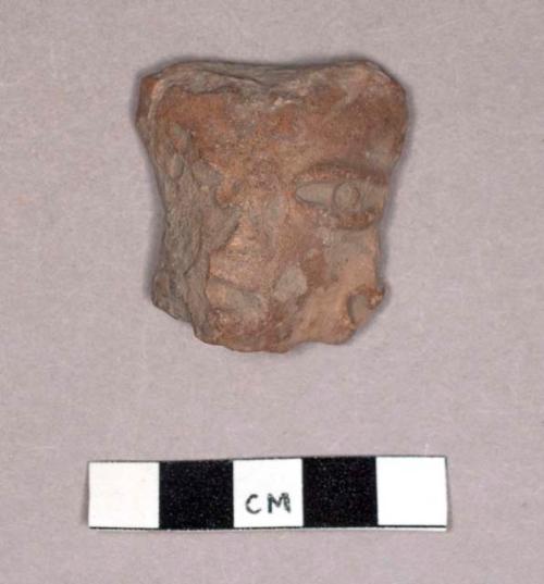 Pottery figurine head fragments