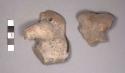 Fragments of pottery figurine bodies.