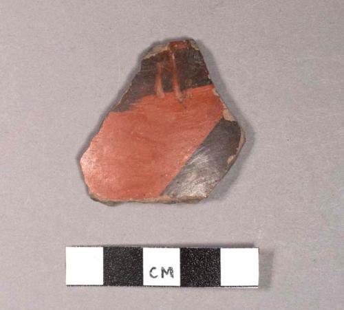 Black on red potsherd