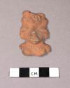 Head and body of small pottery figurine
