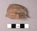 Pottery figurine head