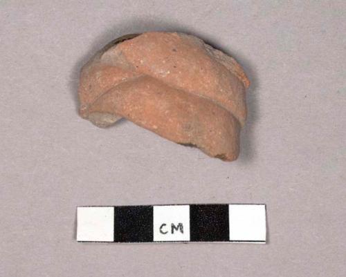 Clay object- figurine headdress fragment