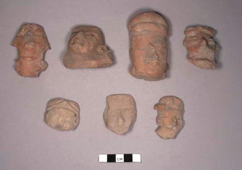 Pottery figurine heads