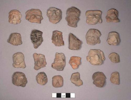 Pottery figurine heads