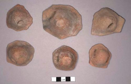 Conical tripod pottery feet with single perforation