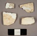 Whiteware and ironstone sherds, including plate rim and base sherds