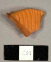 Ribbed redware sherd with lead glaze