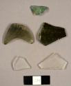 Assorted curved glass fragments