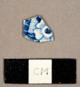 Pearlware sherd with blue floral transfer print