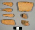 Redware sherds with fragments of lead glaze