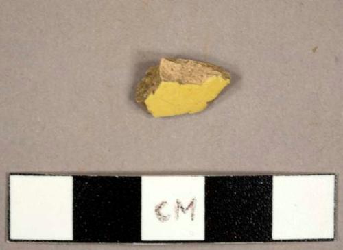 Earthenware sherd with yellow glaze, possibly yellow ware or tin-glazed earthenware