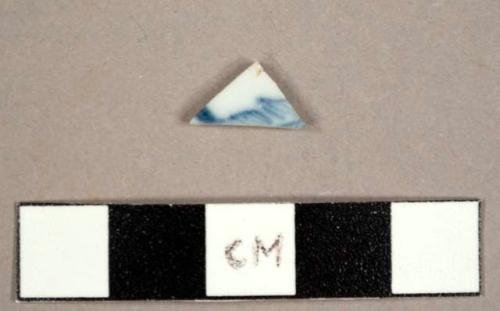 Chinese porcelain sherd with blue hand painted decoration on exterior