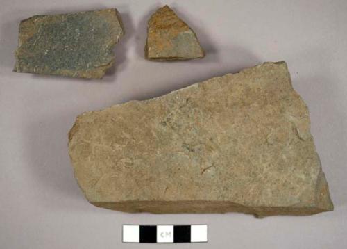 Stone, including slate and Cambridge mudstone, possibly from a foundation