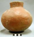 Ceramic complete vessel, plain, short neck, red slip