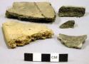 Ceramic rim and body sherds, plain, one mended.