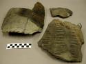 Ceramic sherds, impressed and incised design