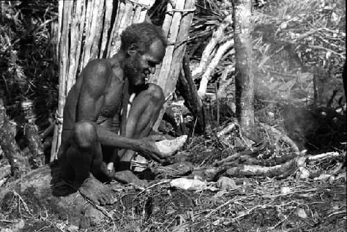 Same. Alugu eating sweet potato. Scrapes off ash.