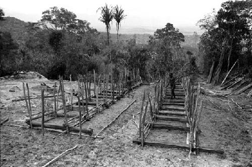 Musanima. Groundplanks laid down for pig sties.