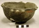 Ceramic complete vessel, large pointed protrusions around rim, mended, sherd mis