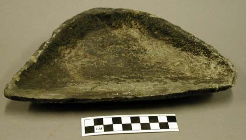 Ground stone bowl, shallow