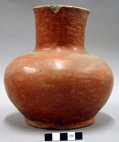 Ceramic vessel, flared rim, platform base, red slip