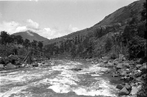 Swinging bridge across Baliem just below Gutima (Kurima) Police Post