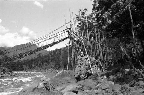 Swinging bridge across Baliem just below Gutima (Kurima) Police Post
