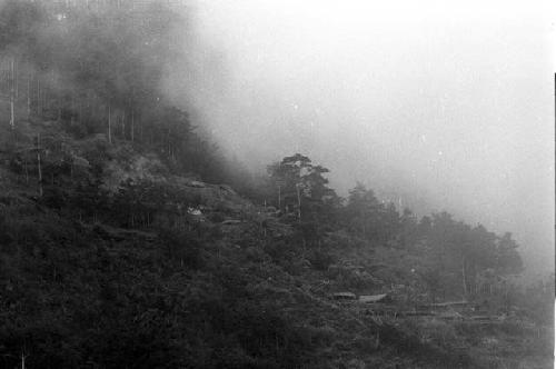 Kilugui Valley. village in mist.