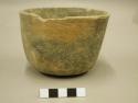 Ceramic bowl, chipped rim, flat base