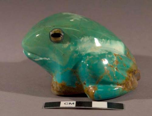 Fetish frog of turquoise with brown stone eyes