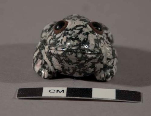 Fetish frog of white spotted black stone, with black and brown agate? eyes