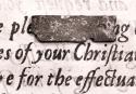Printing type resting on passage from Marmaduke Johnson's printing of John Eliott's The Indian Grammar, Cambridge, MA, 1666.