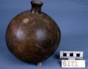 Restored spherical pottery bottle