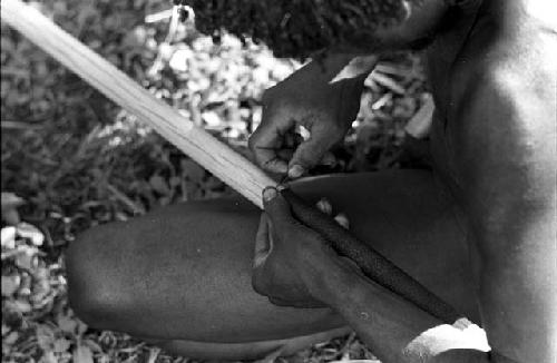 Karl Heider negatives, New Guinea; Wrapping the tikil