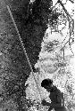 Karl Heider negatives, New Guinea; Man stands with his spear