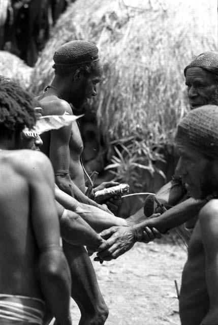 men greeting each other, Egali