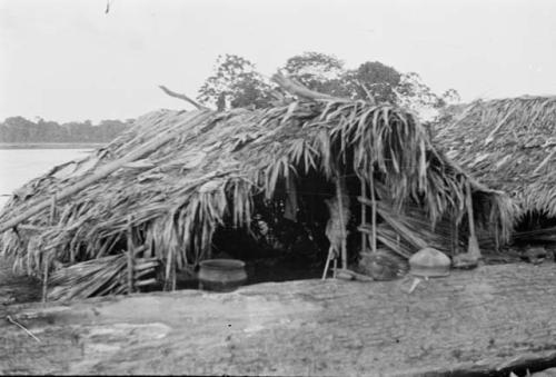 Typical huts built on sandbar in river