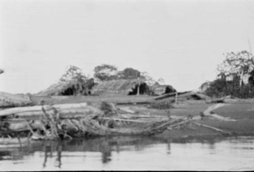Typical huts built on sandbar in river