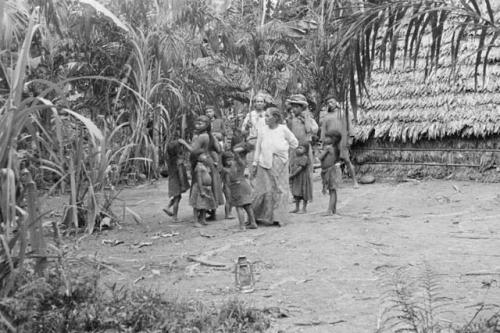 Patron of Sucusari indians with members of tribe