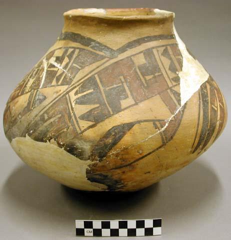 Ceramic jar, polychrome exterior, flared rim, round base, reconstructed