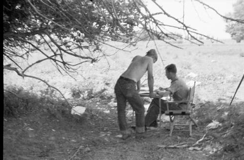 Tooele camp -- Longyear and Mulloy at map table