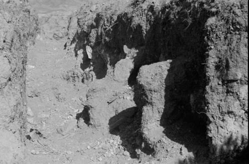 Pit st. 2-13 -- adobe protrusions from S wall, somewhat like pilasters