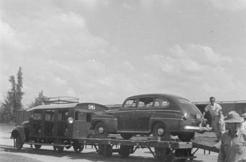 Unidentified cars on trailer