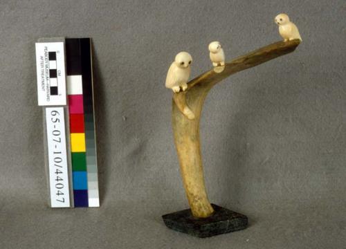 Ivory carving - 3 owls sitting on a tree, set in stone platform