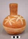 Ceramic vase, straight neck, white on orange floral design around body
